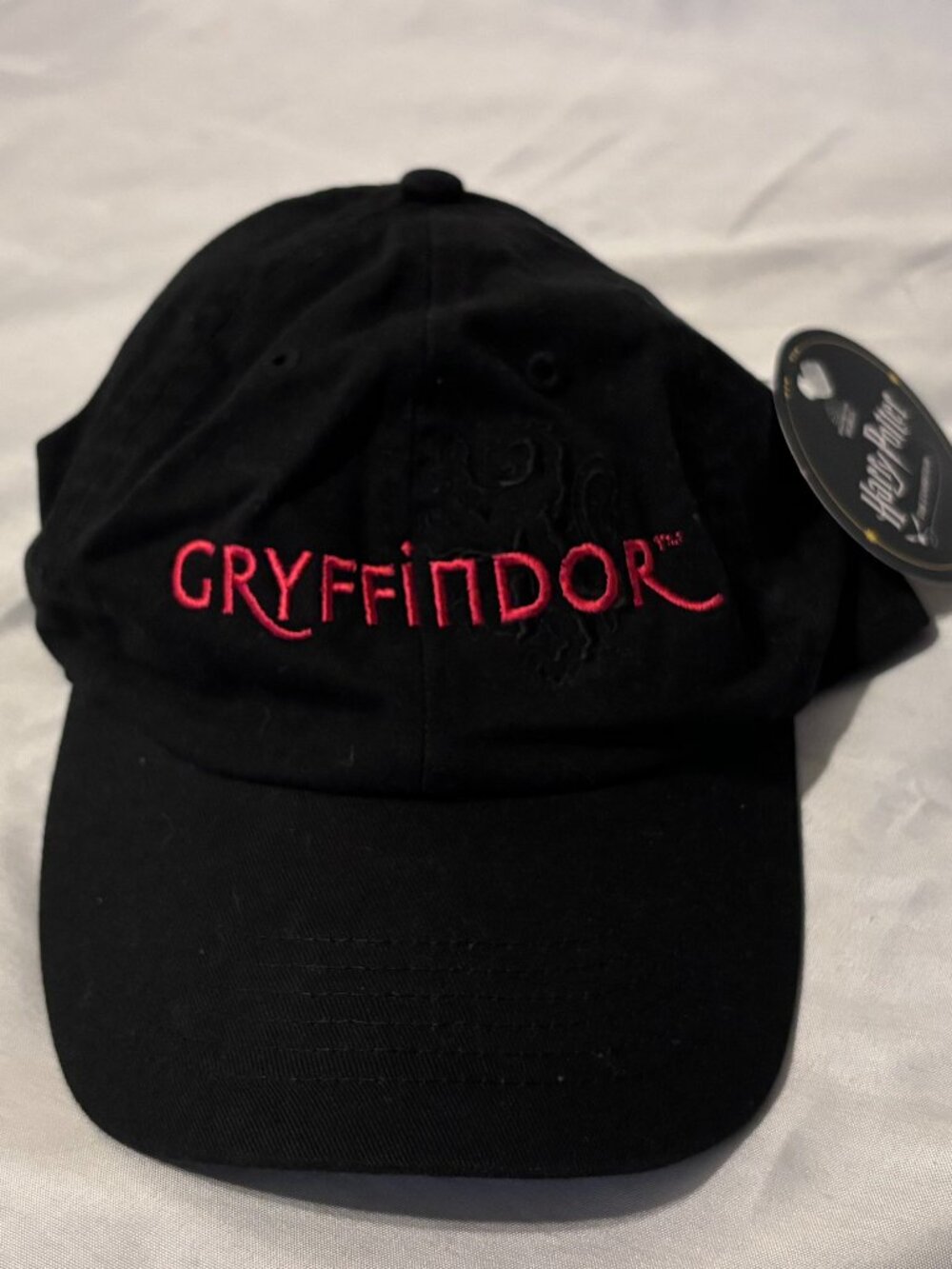 Harry Potter The Exhibition Gryffindor Black Adjustable Cap – One Size NWT